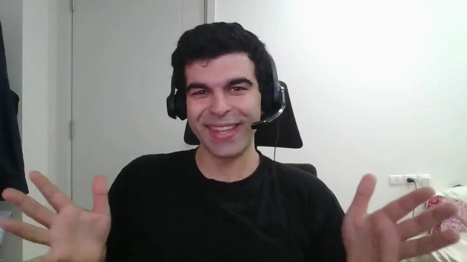 Adam, mid-sentence, talking to camera